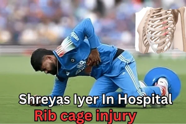 “Cricketer wearing a blue uniform kneeling on the ground and holding his side in pain, indicating a rib injury. An illustration of a rib cage is shown in the corner. Text on the image reads: ‘Shreyas Iyer in hospital — Rib cage injury.’”