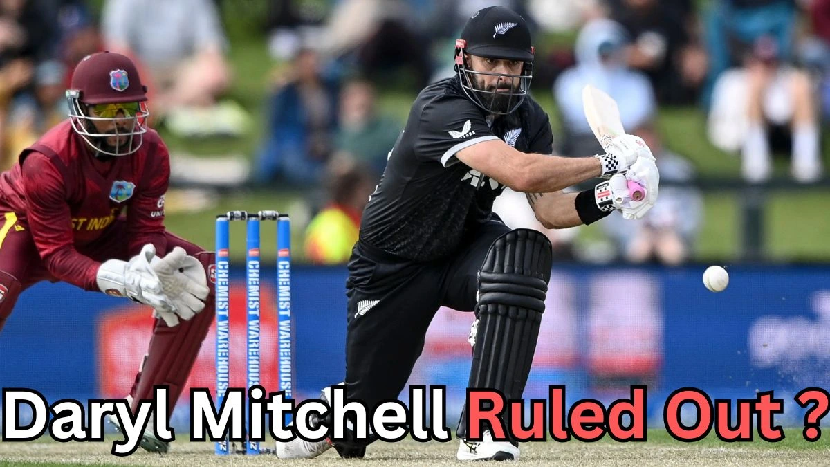 A cricket match scene showing a New Zealand batter playing a shot while a West Indies wicketkeeper crouches behind the stumps. The ball is in motion near the batter’s bat. Text on the image reads: ‘Daryl Mitchell Ruled Out?