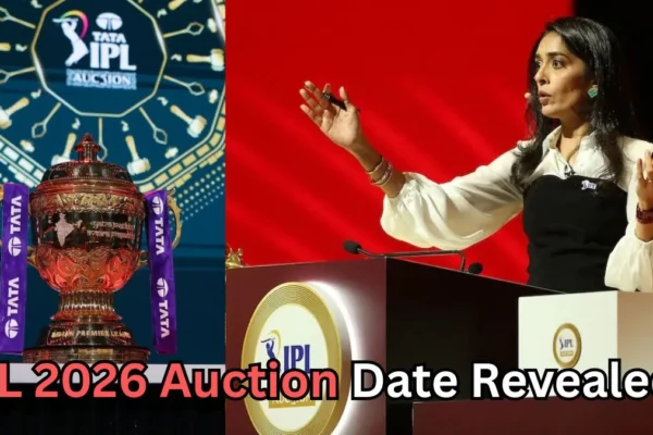 Image split into two sections. On the left, the IPL trophy with TATA branding is displayed against a background featuring the IPL Auction logo. On the right, a woman stands at the IPL auction podium, gesturing as she speaks during the event. Text at the bottom reads ‘IPL 2026 Auction Date Revealed?’ suggesting speculation about the upcoming IPL 2026 auction schedule.