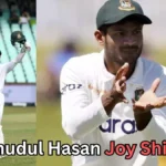 Two photos of a Bangladesh Test cricketer: on the left, he raises his bat and helmet while celebrating on the field; on the right, he focuses on catching a red cricket ball during warm-up or practice. Text at the bottom reads: ‘Mahmudul Hasan Joy Shines?’
