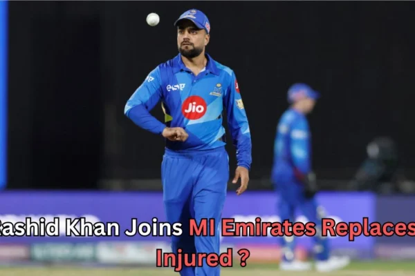 A male cricketer in a blue MI Emirates uniform is on the field, wearing a cap and looking focused while a cricket ball hovers above his hand. Another player in similar blue kit is blurred in the background. Text on the image reads: “Rashid Khan Joins MI Emirates Replaces Injured ?”