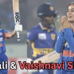 Split image of two women cricketers in blue India jerseys during a night match. Left: a batter wearing a helmet raises her bat in celebration. Right: a bowler with hands together in a thankful gesture, smiling, with an opposing player blurred in the background. Bold on-image text reads “Shafali & Vaishnavi Show!